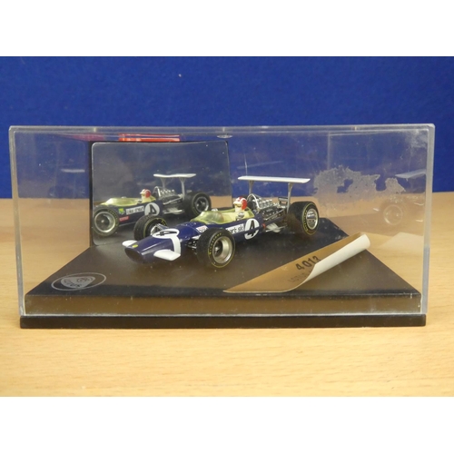 132 - A cased Red Bull Sauber Petronas 1997 Formula One cars, racing driver Nicola Larini and a cased Quar... 