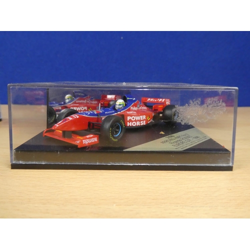 134 - A cased Red Bull Sauber Petronas 1997 Formula One cars, racing driver Johnny Herbert and a cased Ony... 