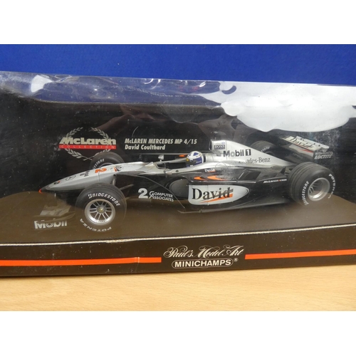 193 - A boxed Minichamps McLaren Mercedes Mp 4/15 driver David Coulthard, scale 1:18.