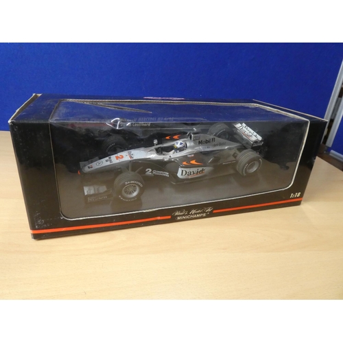 193 - A boxed Minichamps McLaren Mercedes Mp 4/15 driver David Coulthard, scale 1:18.