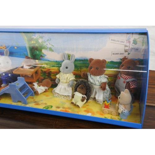 347 - An adorable shop display of Sylvanian Family Animals.