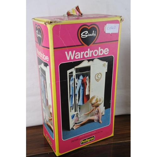 349 - A complete and boxed Sindy Wardrobe.