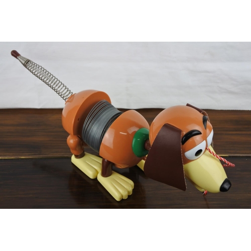 358 - An unboxed Toy Story Slinky Dog toy.