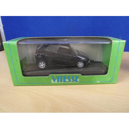 314 - A boxed Vitesse Peugeot 106 car (a/f) and a boxed Kaden Skoda Octavia.