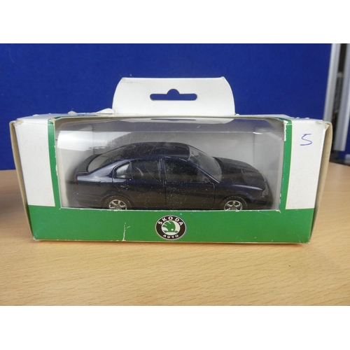 314 - A boxed Vitesse Peugeot 106 car (a/f) and a boxed Kaden Skoda Octavia.