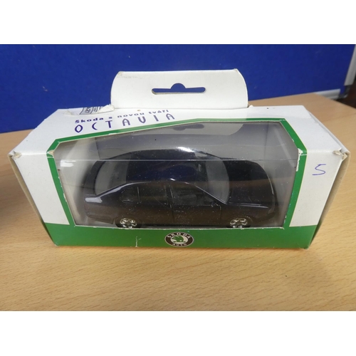 314 - A boxed Vitesse Peugeot 106 car (a/f) and a boxed Kaden Skoda Octavia.