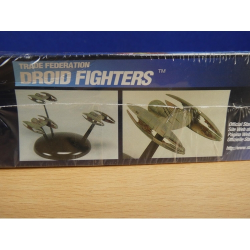 338 - Two boxed Star Wars Episode I Snapfast model kits 'Droid Fighters' and 'Naboo Fighter'.