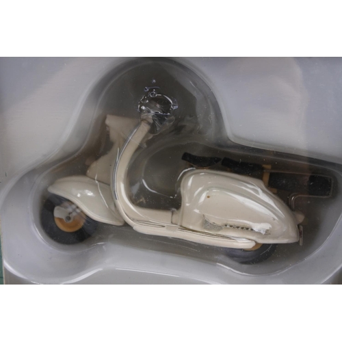 210 - A boxed Xonex Lambretta Scooter.