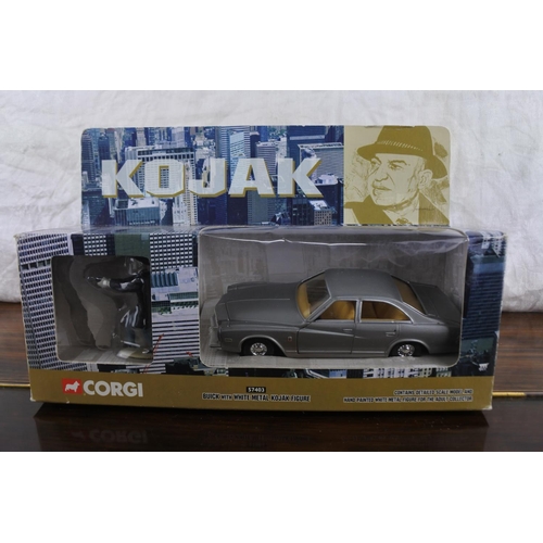 297 - A Corgi 'Kojak' Buick with a Whiit metal figurine.