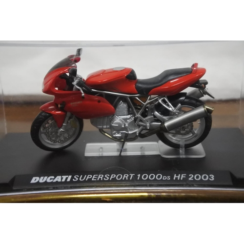 362 - Three cased Ducati motorbikes 'Ducati 999 Testastretta 2003', 'Ducati Supersport 1000ds HF2003' and ... 