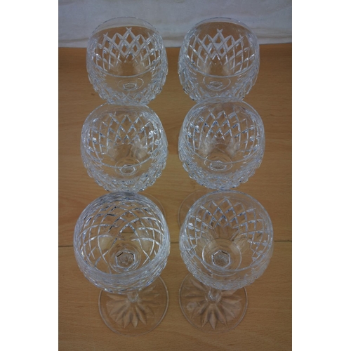 59 - A stunning set of five Waterford wine glasses and another.