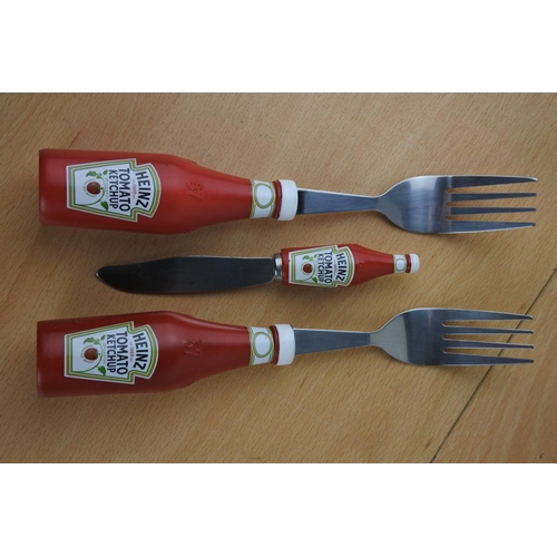 68 - Two Heinz cutlery forks and knife and 'I Love Hotdogs' dish.