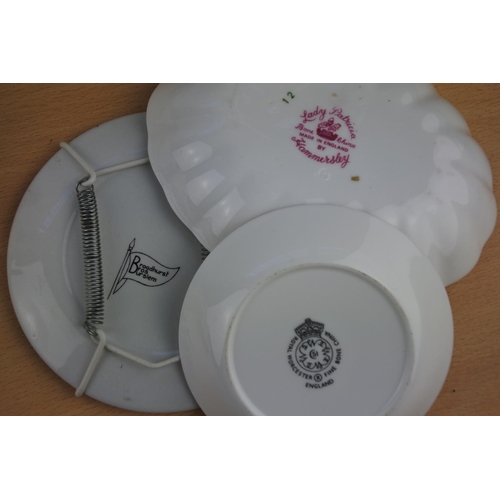 84 - A collection of small plates to include Hammersley, two boxed Goebel plates and more.