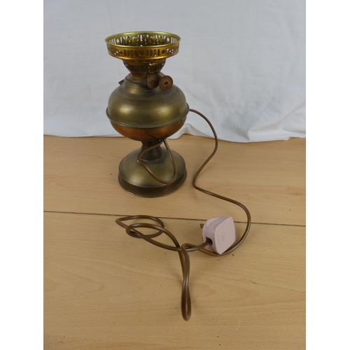 102 - An electric table lamp base in the style of an oil lamp.