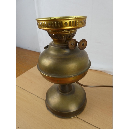 102 - An electric table lamp base in the style of an oil lamp.