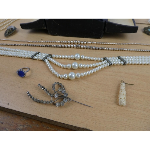 110 - A collection of vintage pearls and necklaces in an antique jewellery box.