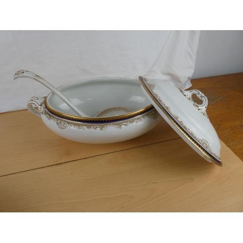 115 - Two antique Booth pottery lidded tureens and ladle.