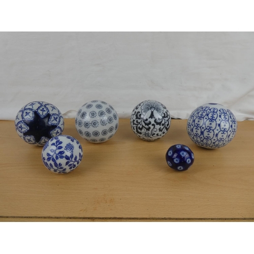 123 - A collection of 6 decorative balls.