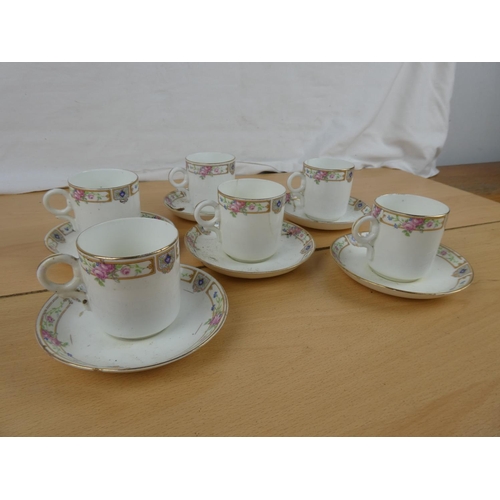 125 - An antique twelve piece coffee set.