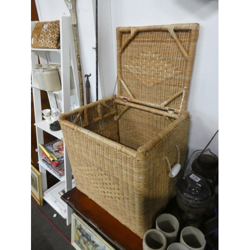 136 - A large wicker storage basket. Approx 52x52x41cm.