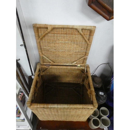 136 - A large wicker storage basket. Approx 52x52x41cm.