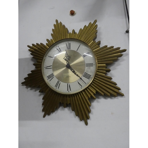 140 - A stunning vintage Quartz sundial wall clock. Approx 42cm.