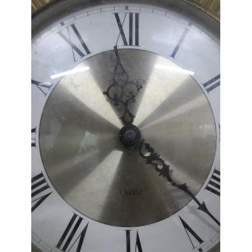 140 - A stunning vintage Quartz sundial wall clock. Approx 42cm.