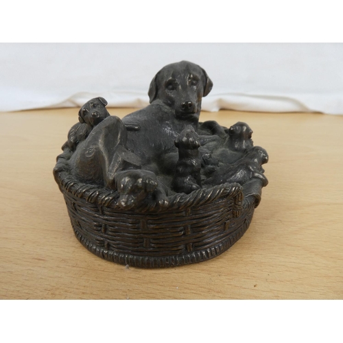 146 - A labrador dog and pups ornament.