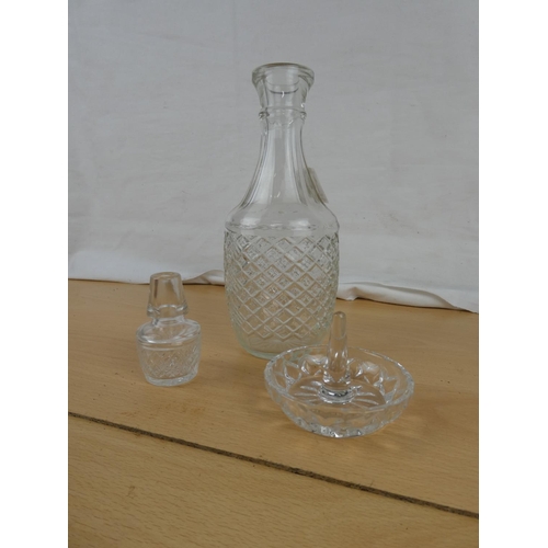 147 - A small vintage glass decanter and ring holder.