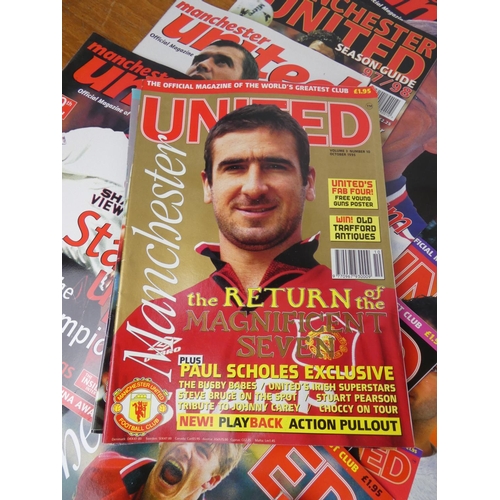 148 - A large lot of Manchester United official magazines.