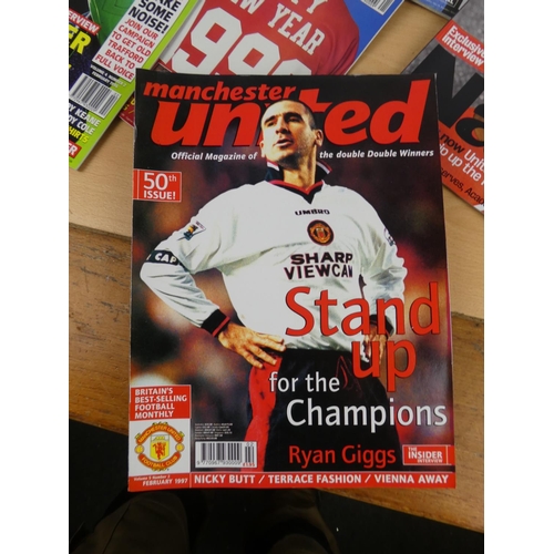 148 - A large lot of Manchester United official magazines.