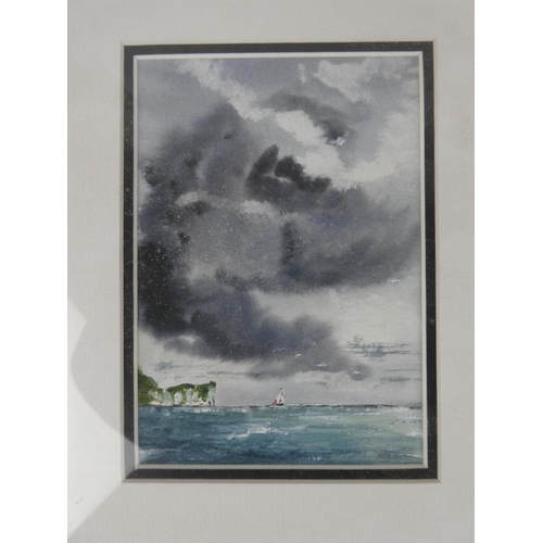 149 - Two framed watercolours of the North Coast signed E Mac. Approx 17x12cm.