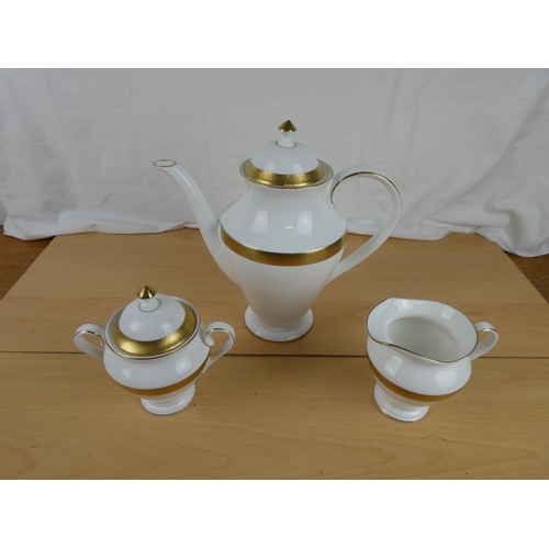 164 - A stunning Waterford pottery coffee pot and matching milk jug and sugar bowl.