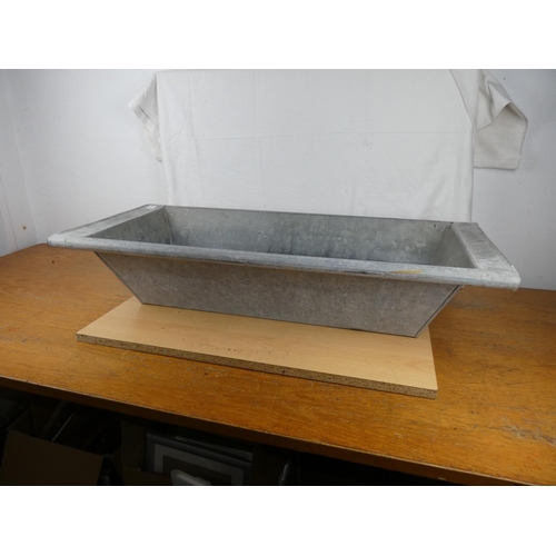 177 - A galvanised trough. Approx 95x42x25cm.