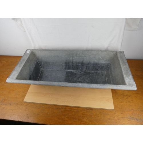 177 - A galvanised trough. Approx 95x42x25cm.