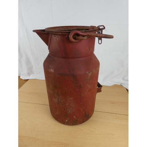 183 - An antique lidded milk pail.