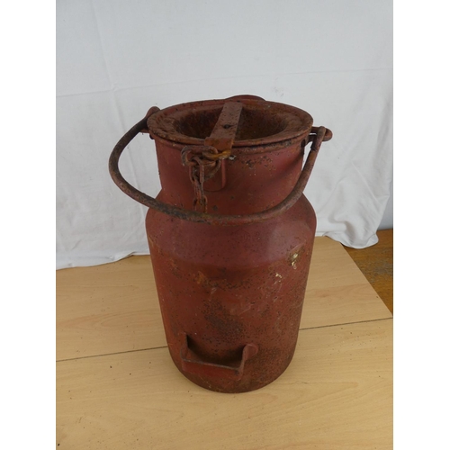 183 - An antique lidded milk pail.