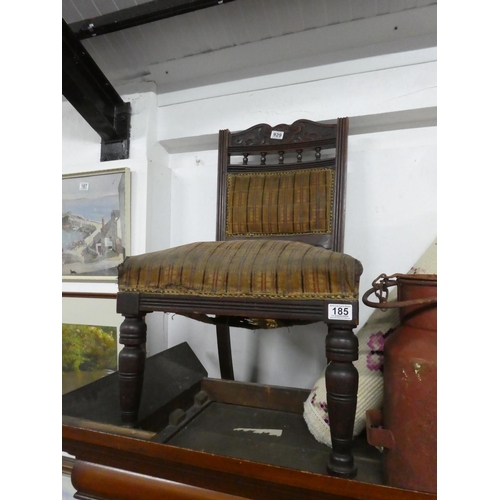 185 - An antique mahogany upholstered hall chair.