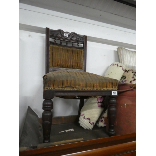 185 - An antique mahogany upholstered hall chair.