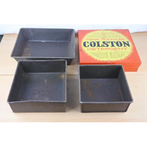 204 - A lot of vintage baking tins and a vintage Colston tin box.