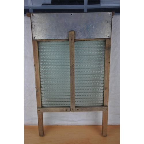 206 - A vintage glass wash board. Approx 58x33cm.