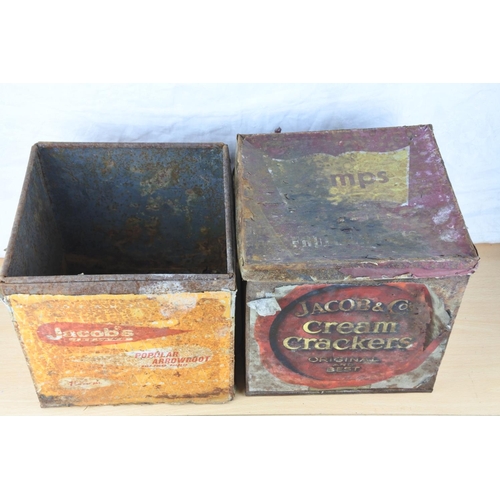 209 - A vintage Jacob's Cream Crackers shop tin and another. Approx 23cm sq each.