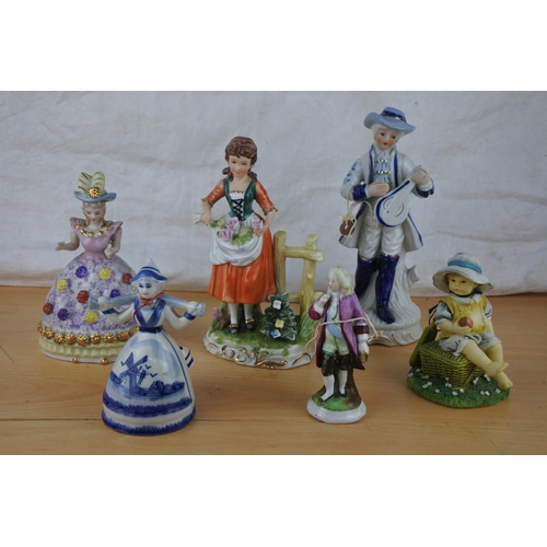 221 - A collection of figurine ornaments.