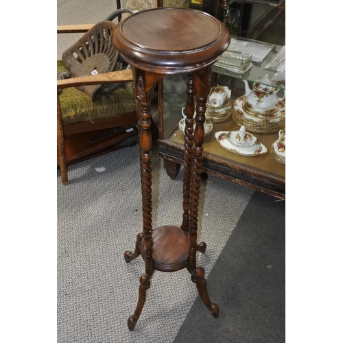 225 - A mahogany plantstand.