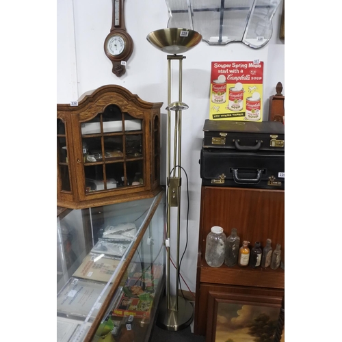 229 - A spotlight and uplighter floor lamp. Approx 6ft