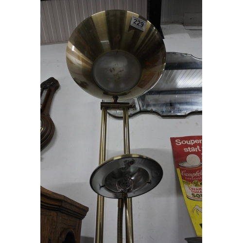 229 - A spotlight and uplighter floor lamp. Approx 6ft