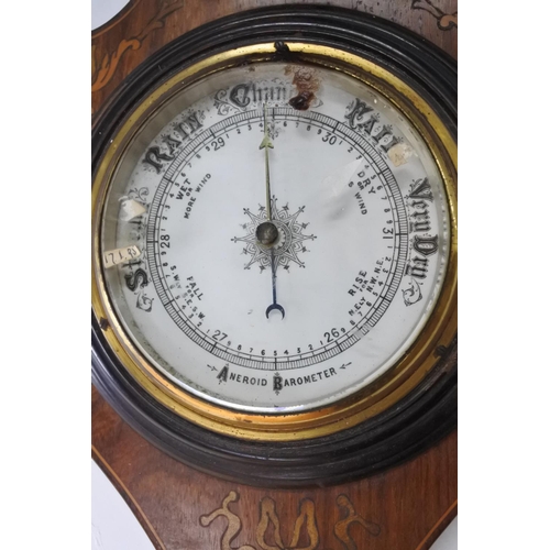 231 - An antique barometer with inlay detail.