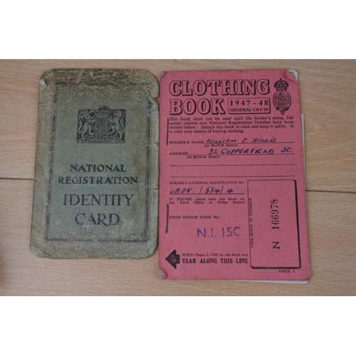 247 - An interesting lot of paperwork to include a 1947/1948 clothing book and more.