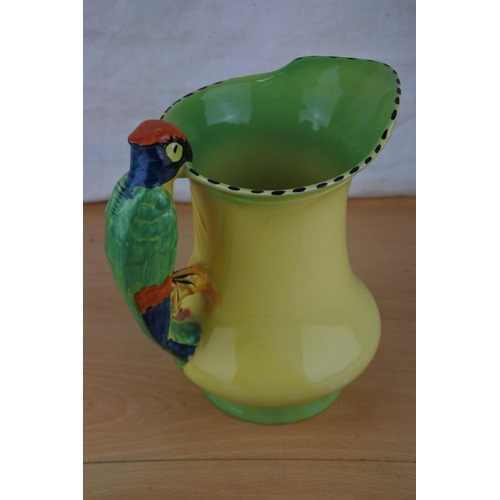 258 - A Burleigh Ware parrot handled jug.