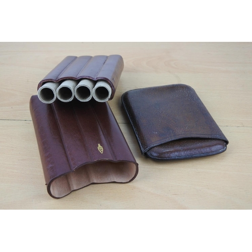 262 - A stunning vintage leather cigar case and another.